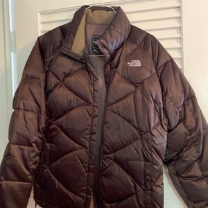 No face brown jacket